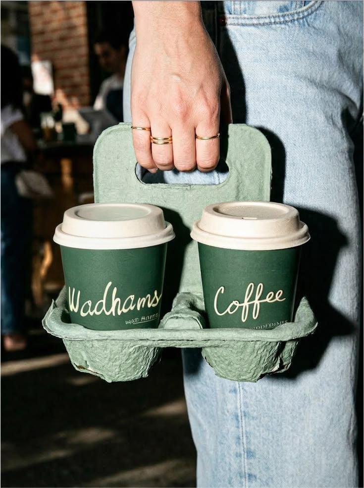 Two Wadhams Coffee cups in a green carry tray